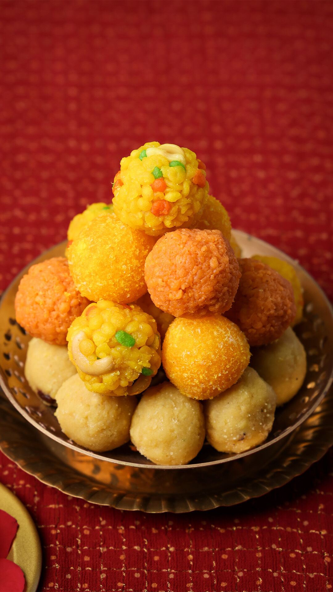 An assortment of festive laddoos, including boondi laddoo, besan laddoo, and other traditional varieties, perfect for Ram Navami celebrations.